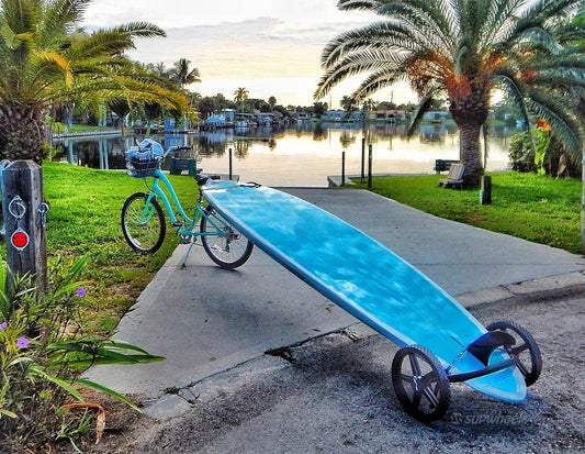 surfboard wheels carrying a surfboad behind a bike sup wheels