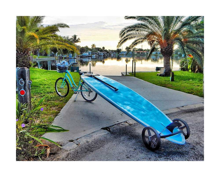 Hard paddle board carriers for walking and biking