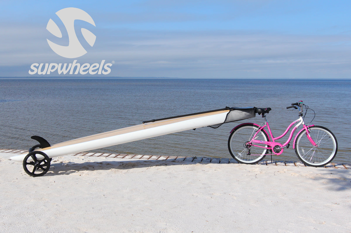 SUP Wheels with a paddle board connected to a beach cruiser bicycle configuration