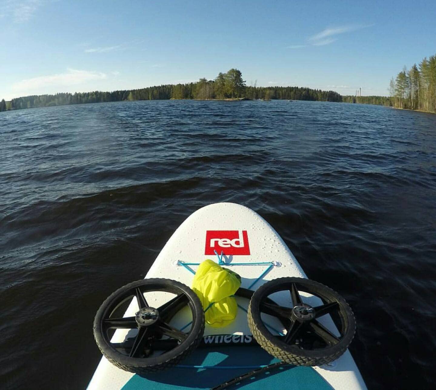 SUP Wheels in storage configuration on a RED brand paddle board